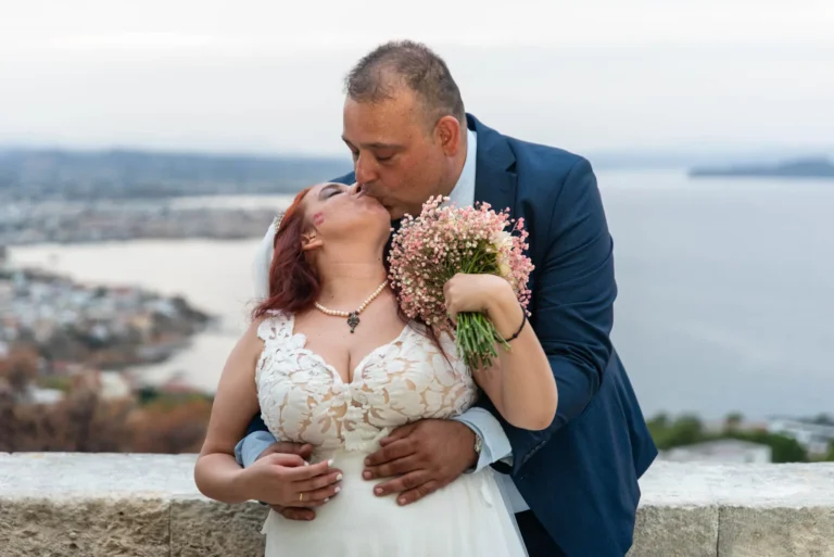 Amalia & Antonis — Orthodox Wedding at Profitis Ilias Akrotiri, Chania 5 Bride and groom kissing after Orthodox wedding at Profitis Ilias Akrotiri Chania with panoramic sea view