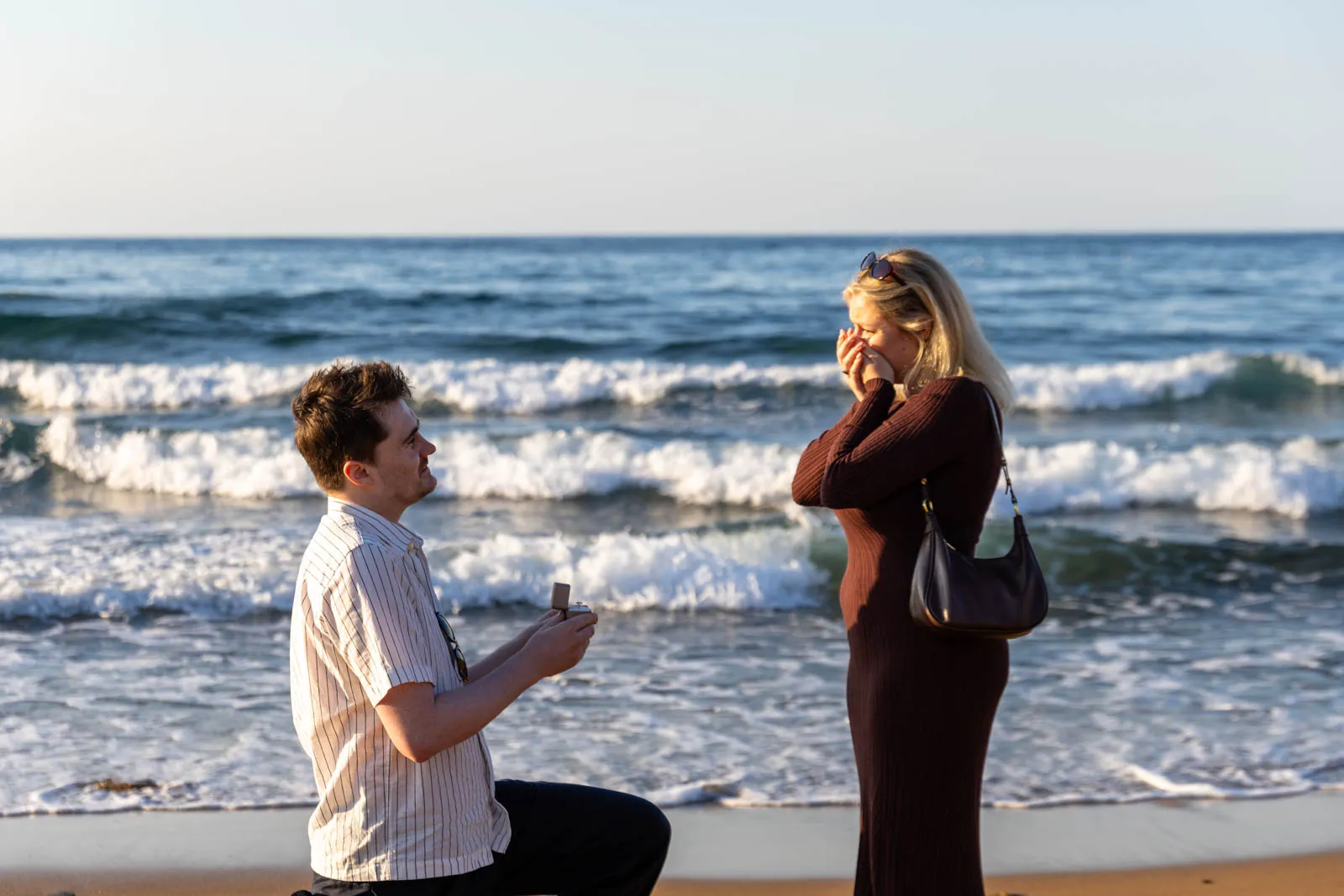 Imogen reacting emotionally as Euan proposes on Stalos Beach in Crete